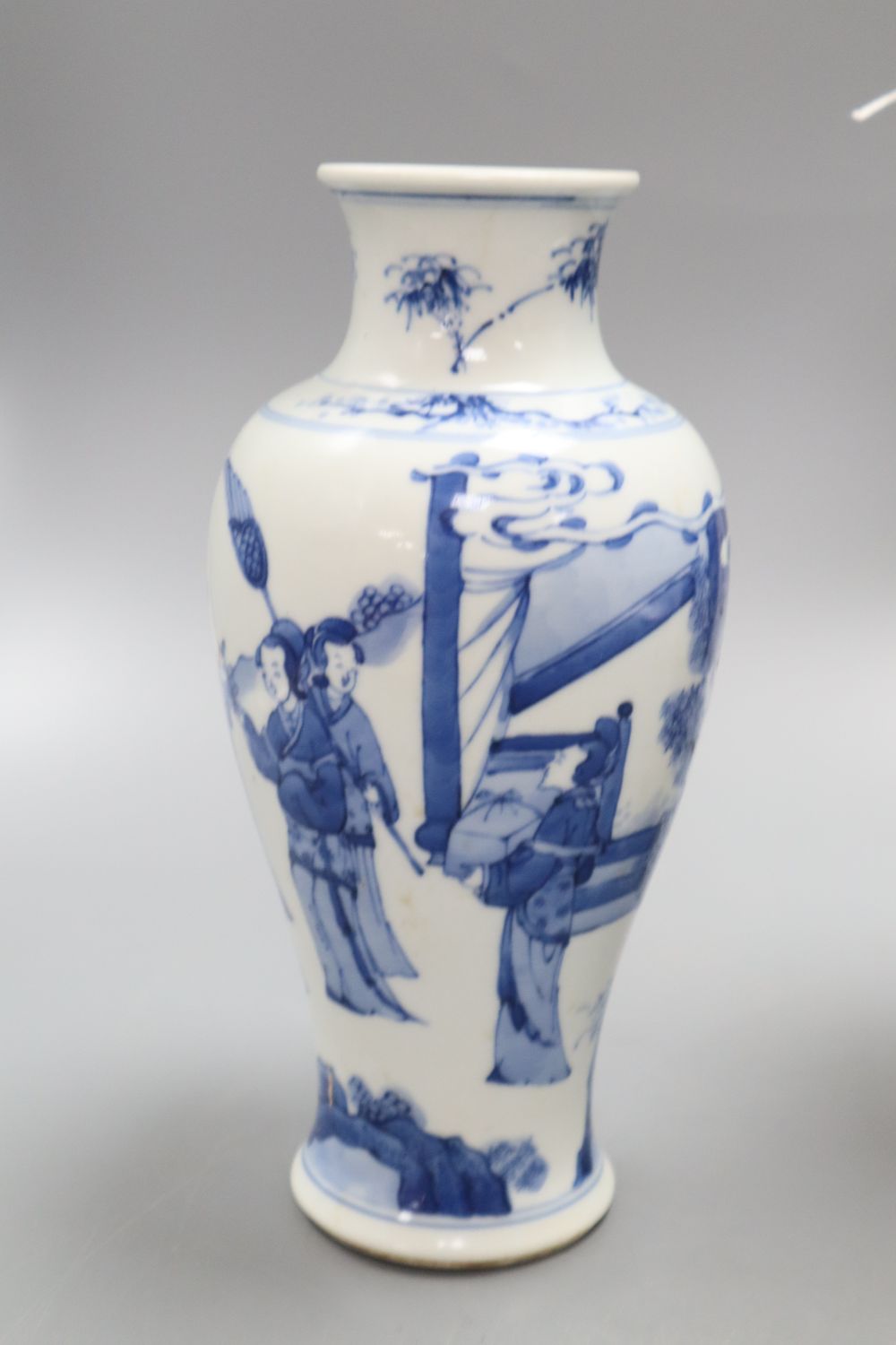 A Chinese famille rose crackleglaze vase and cover, together with a Chinese blue and white figural vase bearing Kangxi mark,